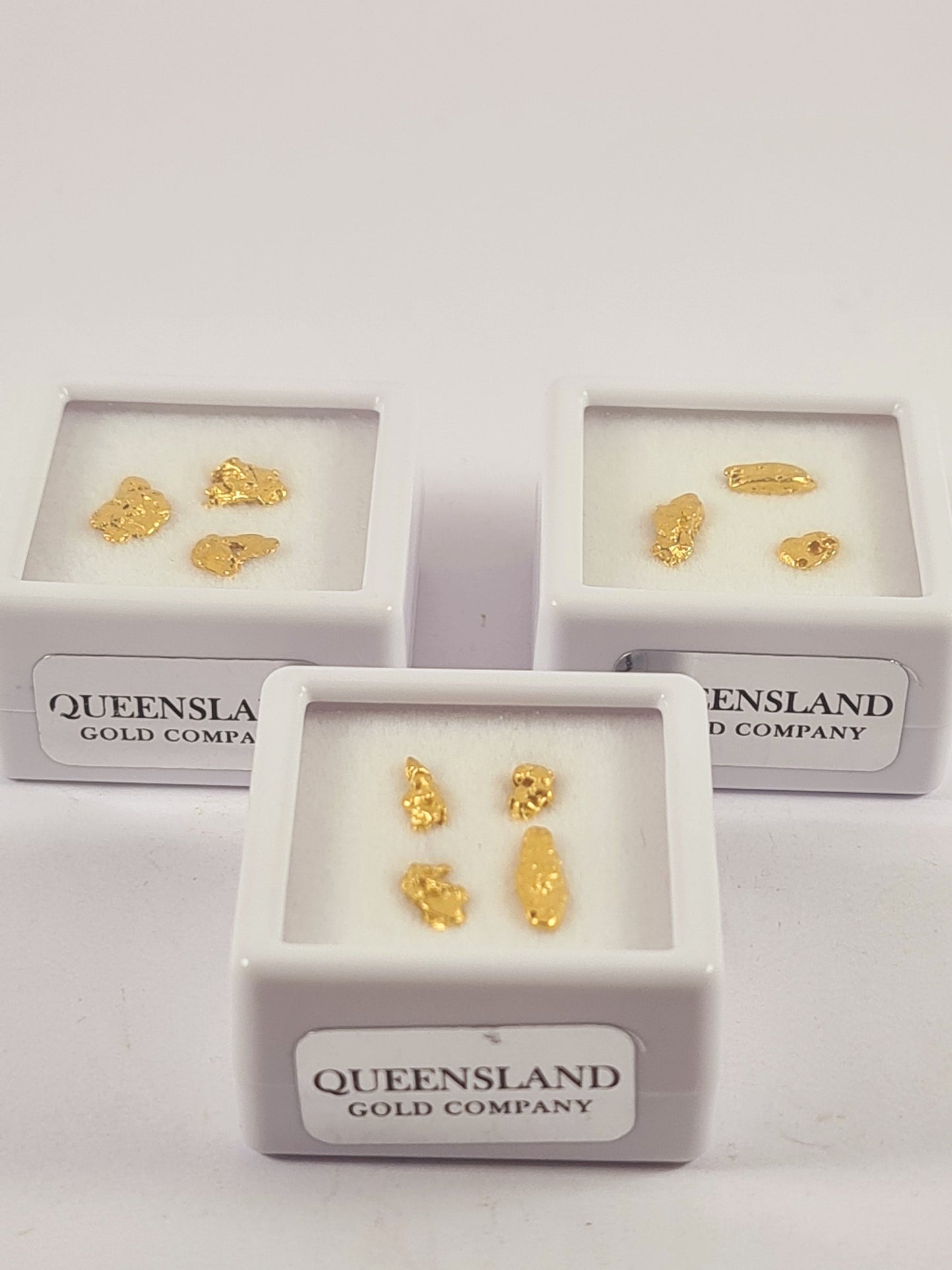 Three example Queensland Gold Company natural gold allocations